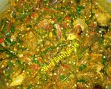A picture of step 8 of Fresh okra with snails.