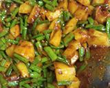 A picture of step 4 of Cluster beans and potato vegetable.
