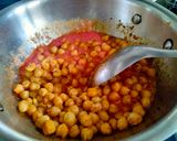 A picture of step 2 of Punjabi thali (chole with rice, creamy Palak paneer, spicy onion lachcha and refreshing lassi).