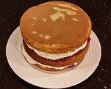 A picture of step 20 of Vanilla Lemon Raspberry Layer Cake with Whipped Cream Buttercream Frosting.