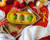 A picture of step 4 of PAAN COCONUT LADDU / BETEL leaf laddu/ Milkmaid paan coconut laddu.