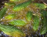 A picture of step 2 of Bharwa karele (bitter gourd).