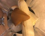 A picture of step 1 of Maddie’s Peanut Butter Banana Workout Smoothie.