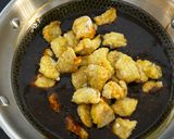 A picture of step 12 of Sweet and Spicy Orange Chicken.
