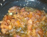 A picture of step 2 of Gobhi mussalam.