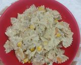 A picture of step 7 of Chicken cheese white sauce farfalle pasta.