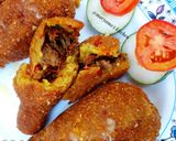 A picture of step 13 of Stuffed sweet potatoe drumsticks.
