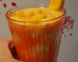 A picture of step 5 of Mango shake with chunks.