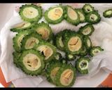 A picture of step 2 of Bitter gourd cashew pickle.