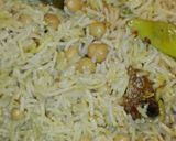 A picture of step 8 of Achari Chaana Pulao.