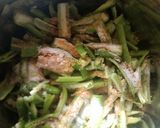 A picture of step 3 of Green chilli pickles.