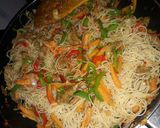 A picture of step 4 of Singapore noodles/ rice sticks.