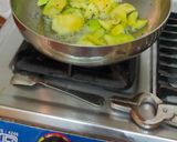 A picture of step 2 of Kacchi keri ka khatta metha aachar.