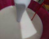 A picture of step 1 of Roohafza and milk sharbat.