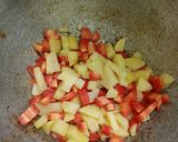 A picture of step 2 of Aloo Gajar Matar.