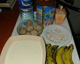 A picture of step 1 of Fura da nono with banana and coconut.