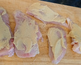 A picture of step 1 of Mustard chicken in carrot and parsnip sauce.