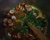 A picture of step 3 of Tumeric rice with sausages, egg curry and salad.