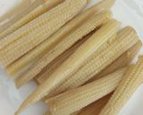 A picture of step 1 of Baby Corn fingers with cheesy dip.