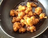 A picture of step 10 of Crispy Saucy Cauliflower.