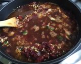 Une image de l'étape 15 de Dahl de lentilles jaunes aux carottes violettes, tomates et courgette.