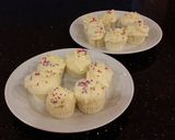 A picture of step 25 of White Chocolate Truffle Cupcakes with Whipped White Chocolate Mascarpone Frosting.