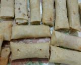 A picture of step 5 of Tandoori chicken rolls.