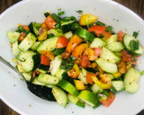 A picture of step 2 of Cucumber salsa🥒🍅🍋.