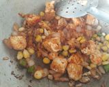 A picture of step 6 of Ragi tacos with paneer and corn filling.