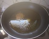 A picture of step 2 of Turmeric-Ginger Pickle.