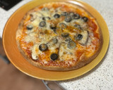 Foto del paso 4 de la receta: Pizza con champiñones