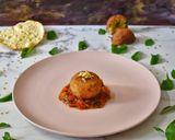 A picture of step 9 of Bhata dalma Arancini.