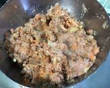 Une image de l'étape 16 de Courgettes farcies carotte jambon emmental.