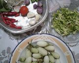 Foto langkah ke 1 dari resep Tumis Terong Bunga Pepaya.