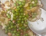 A picture of step 2 of Potato Peas Onion Poha.