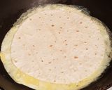 A picture of step 8 of Curry Chicken Egg Cheese Tortilla Wrap.
