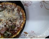 A picture of step 5 of Omelette Pizza.