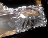 Foto del paso 4 de la receta: Dorada al horno en papillote