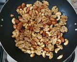 A picture of step 3 of Honey roasted nuts.