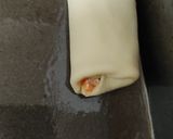 A picture of step 14 of 3 spice chicken filled bread.
