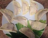 Foto del paso 2 de la receta: Empanadillas de mortadela y queso al horno
