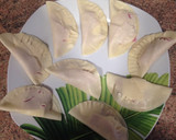 Foto del paso 2 de la receta: Empanadillas de mortadela y queso al horno