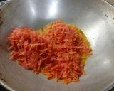 A picture of step 2 of Gajar ka halwa.