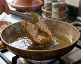 صورة لخطوة 7 من وصفة طاجن الرز والخضار مع السمك المقلي