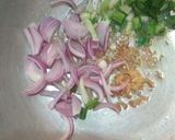A picture of step 2 of Leftover fried rice in cabbage cups.