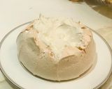 A picture of step 2 of Pavlova with berries and lemon curd.