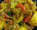 A picture of step 4 of Baingan bhaja.