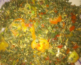 A picture of step 2 of Spinach and egg source with fried egg.
