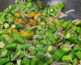 A picture of step 2 of Achari Bhindi Fry.