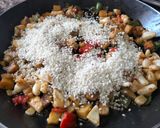 A picture of step 5 of Paella with Cuttlefish and Seasonal Vegetables.